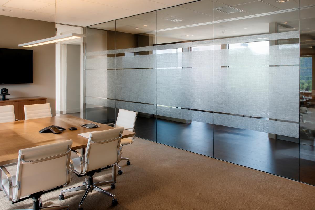 Office conference room with 3M FASARA frosted decorative glass partitions